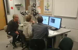 CSIRO scientists performing automated mineralogical analyses using the recently installed TESCAN TIMA.